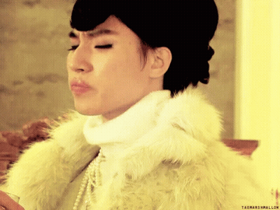 A Woman Wearing A Fur Coat And Pearls Has Taemarshmallow Written On The Bottom Right GIF