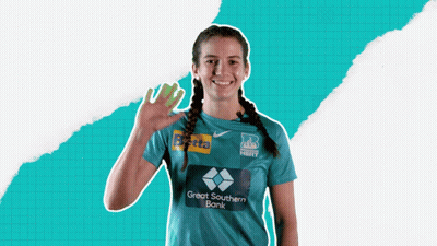 A Woman Wearing A Great Southern Bank Shirt Waves GIF