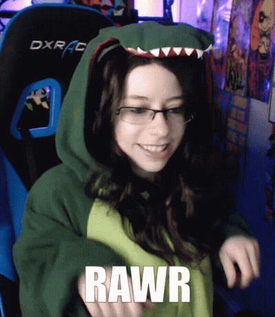 A Woman Wearing A Green Hoodie With The Word Rawr On Her Chest GIF