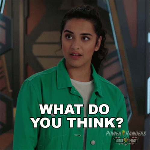 A Woman Wearing A Green Jacket Says What Do You Think GIF