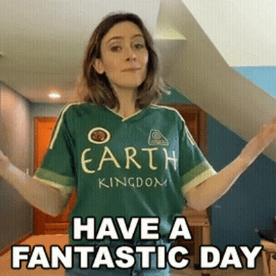 A Woman Wearing A Green Shirt That Says " Earth Kingdom " GIF