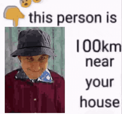 A Woman Wearing A Hat Is Standing Next To A Sign That Says `` This Person Is 100 Km Near Your House '' . GIF