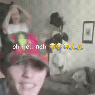 A Woman Wearing A Hat Says " Oh Hell Nah " In A Room GIF