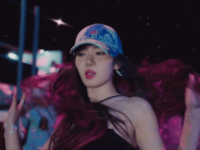 A Woman Wearing A Hat That Says ' Nyc ' On It GIF