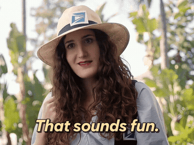 A Woman Wearing A Hat With A Usps Logo On It Says That Sounds Fun GIF