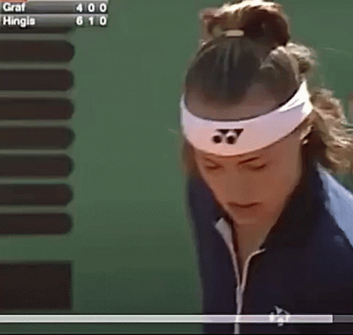 A Woman Wearing A Headband And A Blue Jacket With The Word Hof On The Sleeve GIF