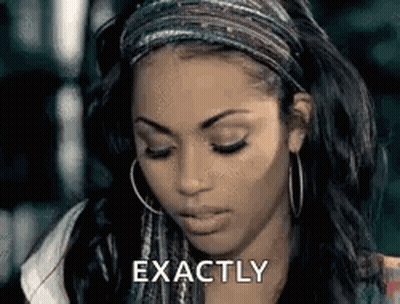 A Woman Wearing A Headband And Hoop Earrings Is Making A Face And Saying `` Exactly '' . GIF