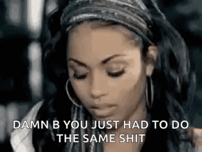 A Woman Wearing A Headband And Hoop Earrings Is Talking About Something . GIF