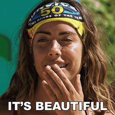 A Woman Wearing A Headband With The Number 50 On It Covering Her Mouth GIF