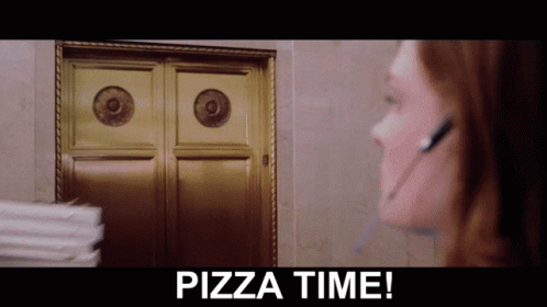 A Woman Wearing A Headset Stands In Front Of A Door With The Words Pizza Time Below Her GIF