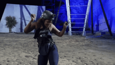 A Woman Wearing A Helmet And A Vest That Says ' Tactical ' On It GIF