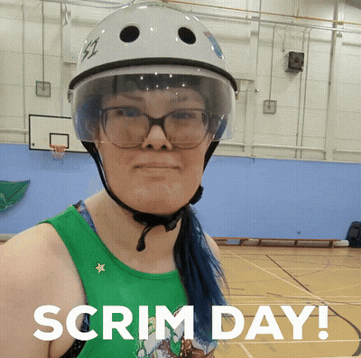 A Woman Wearing A Helmet And Glasses Has The Words Scrim Day Written Below Her GIF