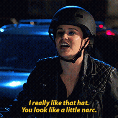 a woman wearing a helmet says i really like that hat you look like a little narco