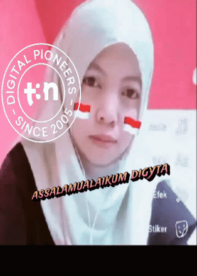 A Woman Wearing A Hijab And A Digital Pioneers Logo GIF
