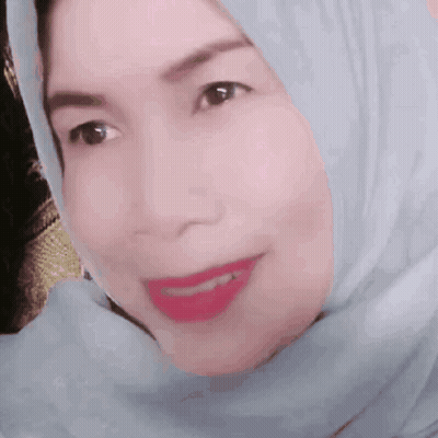 A Woman Wearing A Hijab Has A Sticker That Says Oldies Goodies On Her Face GIF