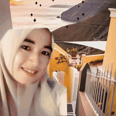 A Woman Wearing A Hijab Is Smiling In Front Of A Painting Of A Landscape GIF