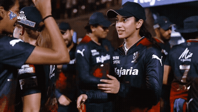A Woman Wearing A Jersey That Says " Kajaria " On It GIF