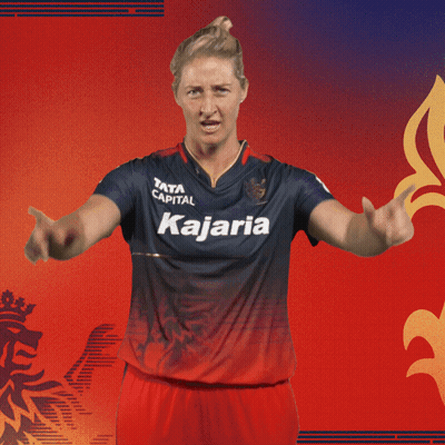 A Woman Wearing A Jersey That Says Raja La On It GIF