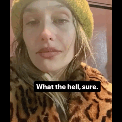 A Woman Wearing A Leopard Print Coat And A Yellow Hat Is Crying And Says What The Hell , Sure . GIF