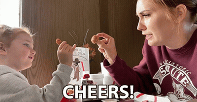 A Woman Wearing A Maroon Sweatshirt That Says ' Historic State ' On It GIF