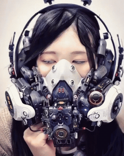 A Woman Wearing A Mask That Says L357 GIF