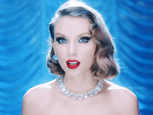A Woman Wearing A Necklace That Says ' 000 ' On It GIF