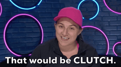 A Woman Wearing A Pink Hat And A Black Jacket Is Making A Funny Face And Saying That Would Be Clutch . GIF