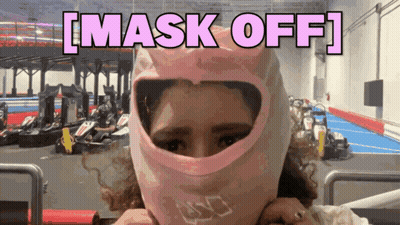 A Woman Wearing A Pink Helmet With The Words Mask Off On The Bottom GIF