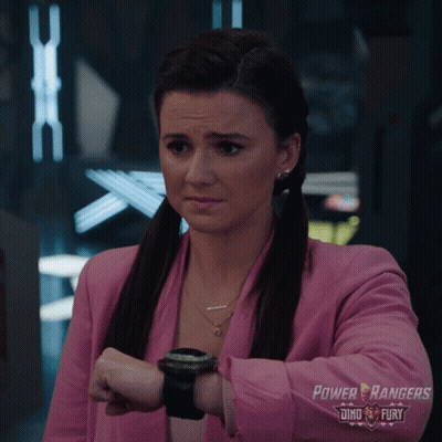 A Woman Wearing A Pink Power Rangers Shirt GIF