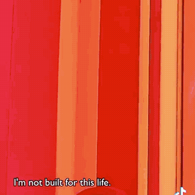 A Woman Wearing A Pink Robe With A Hood Says I 'M A Soft Gal . GIF