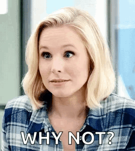 A Woman Wearing A Plaid Shirt Is Asking Why Not ? GIF