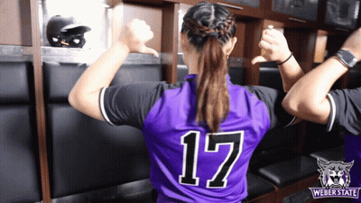A Woman Wearing A Purple Jersey With The Number 17 GIF