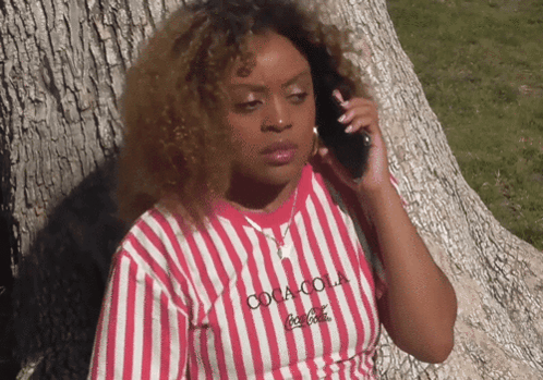 Woman Wearing Coca Cola Shirt GIF