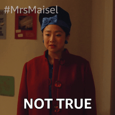 A Woman Wearing A Red Coat And A Blue Headband Says " Not True " GIF