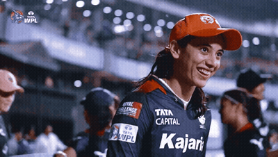 A Woman Wearing A Red Hat And A Jersey That Says Kajari GIF