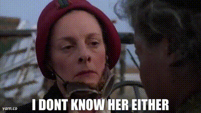 A Woman Wearing A Red Hat Is Talking To Another Woman And Says `` I Do N't Know Her Either '' . GIF