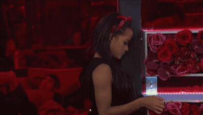 A Woman Wearing A Red Headband That Says ' I Love You ' GIF
