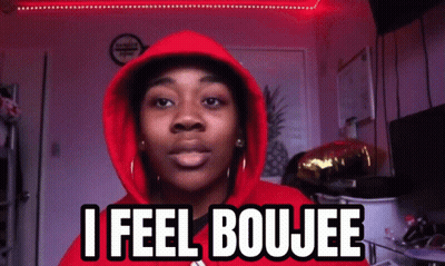 A Woman Wearing A Red Hoodie Says " I Feel Boujee " GIF