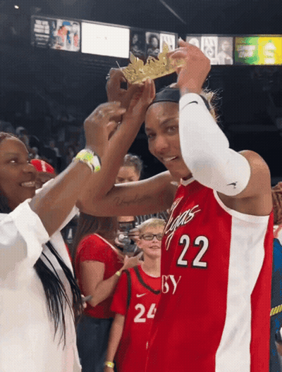 A Woman Wearing A Red Jersey With The Number 22 GIF
