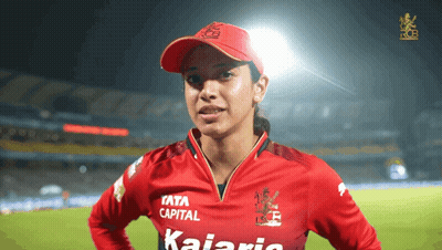 A Woman Wearing A Red Shirt That Says " Kalaria " On It GIF