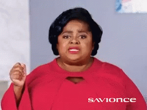 A Woman Wearing A Red Shirt That Says Savionce GIF