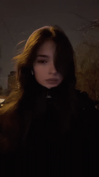 A Woman Wearing A Ring On Her Finger GIF