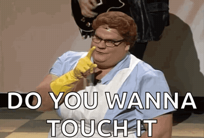 A Woman Wearing A Rubber Glove Says " Do You Wanna Touch It " In Front Of A Man Playing A Guitar GIF