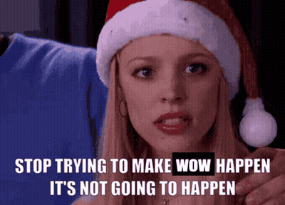 A Woman Wearing A Santa Hat Says Stop Trying To Make Wow Happen GIF