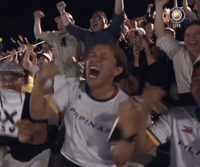 A Woman Wearing A Shirt That Says Pilipinas Screams In A Crowd GIF