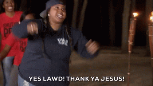 A Woman Wearing A Shirt That Says Shut Up And Pray GIF