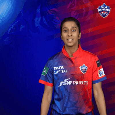 A Woman Wearing A Shirt That Says Tata Capital GIF