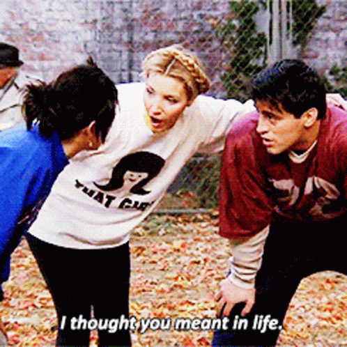 A Woman Wearing A Shirt That Says " That Girl " Stands Between Two Men And Says " I Thought You Meant In Life " GIF