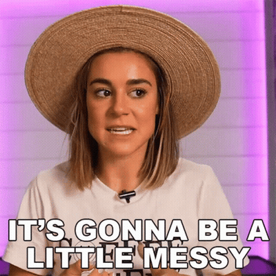 A Woman Wearing A Straw Hat And A White Shirt Says It 'S Gonna Be A Little Messy GIF