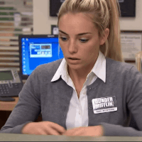 A Woman Wearing A Sweater That Says Burger Mifflin On It GIF